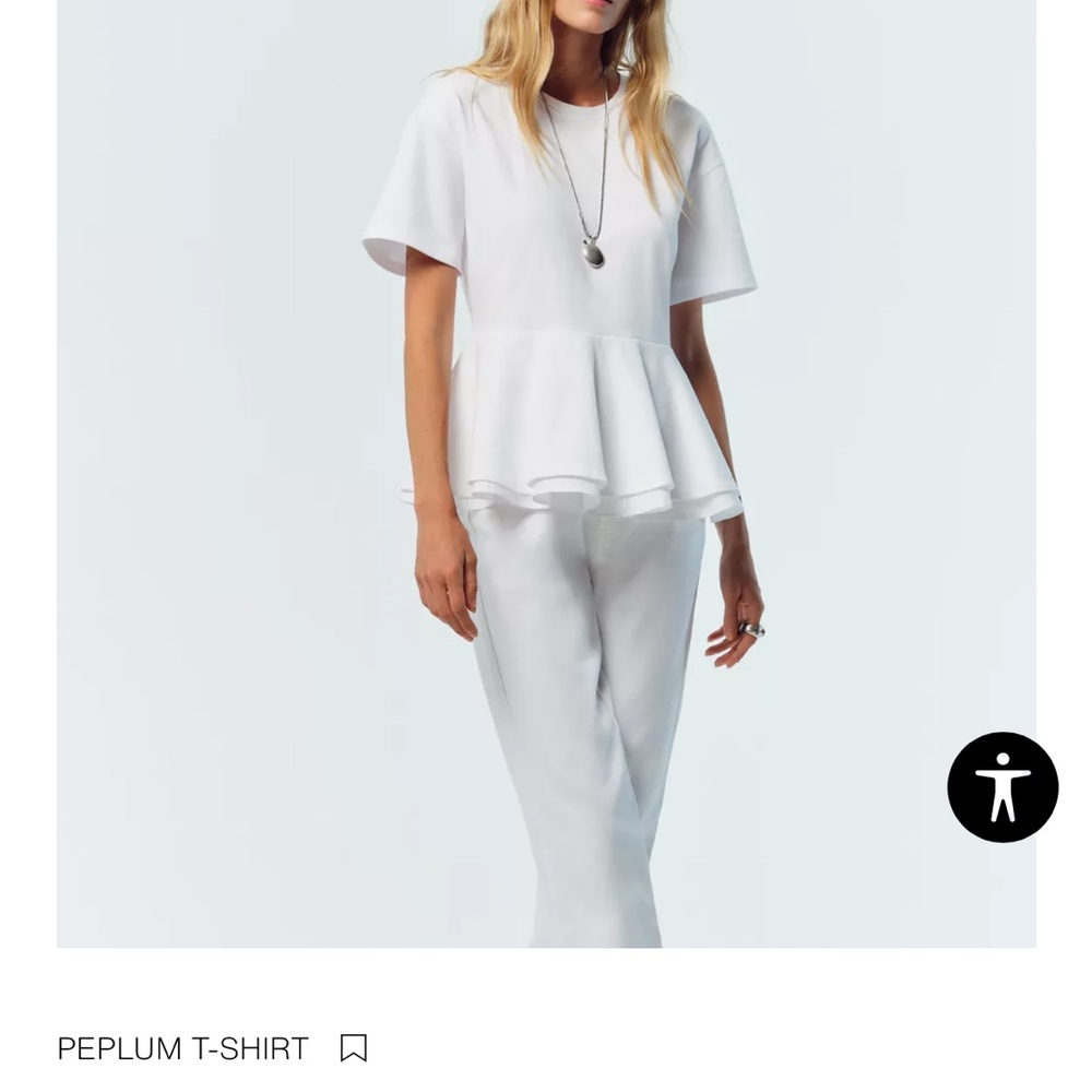 Zara Elegant White Peplum top
Never worn came in mail as gift